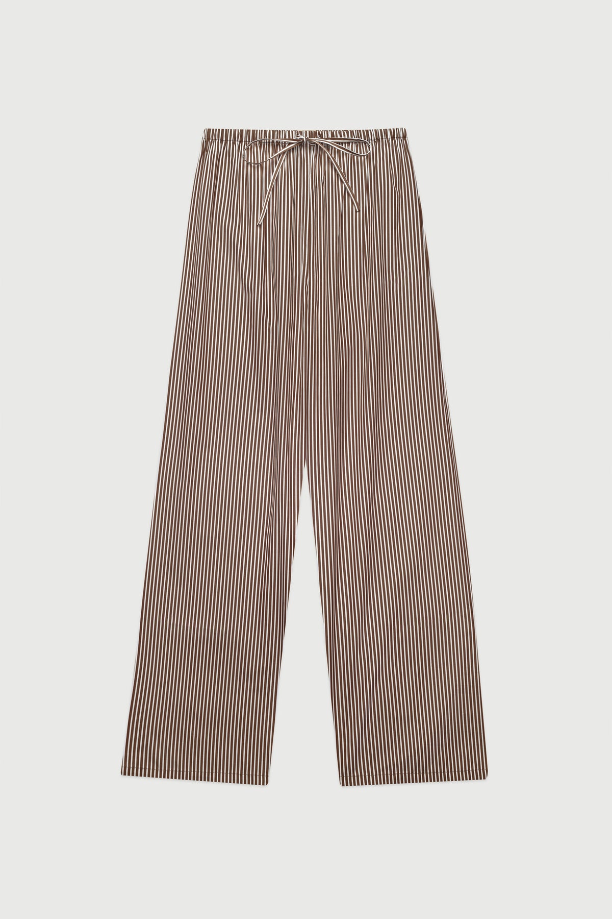 A pair of Comme Si wide-leg trousers with a vertical brown and beige stripe pattern, featuring an elastic waistband and a drawstring tie, shown flat on a light gray background.