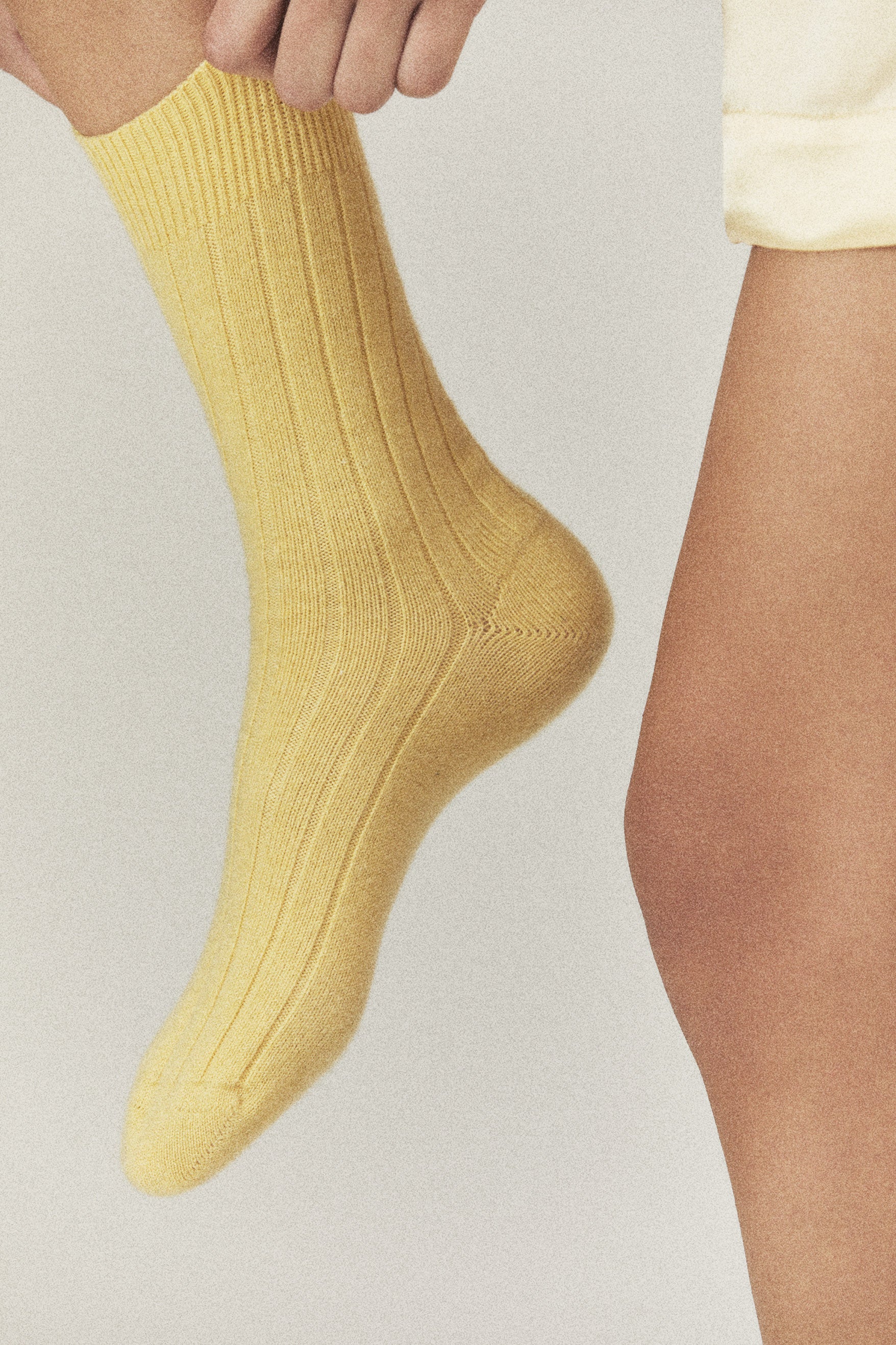The Danielle Sock in Butter on figure, cashmere socks by Comme Si