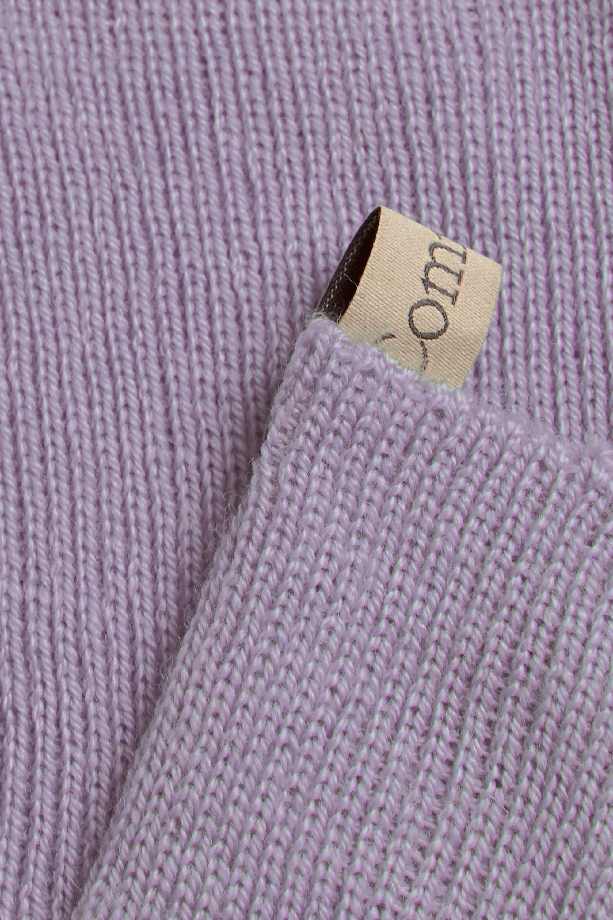 Ribbon tag cuff detail, The Merino Sock in Lilac, made with merino wool