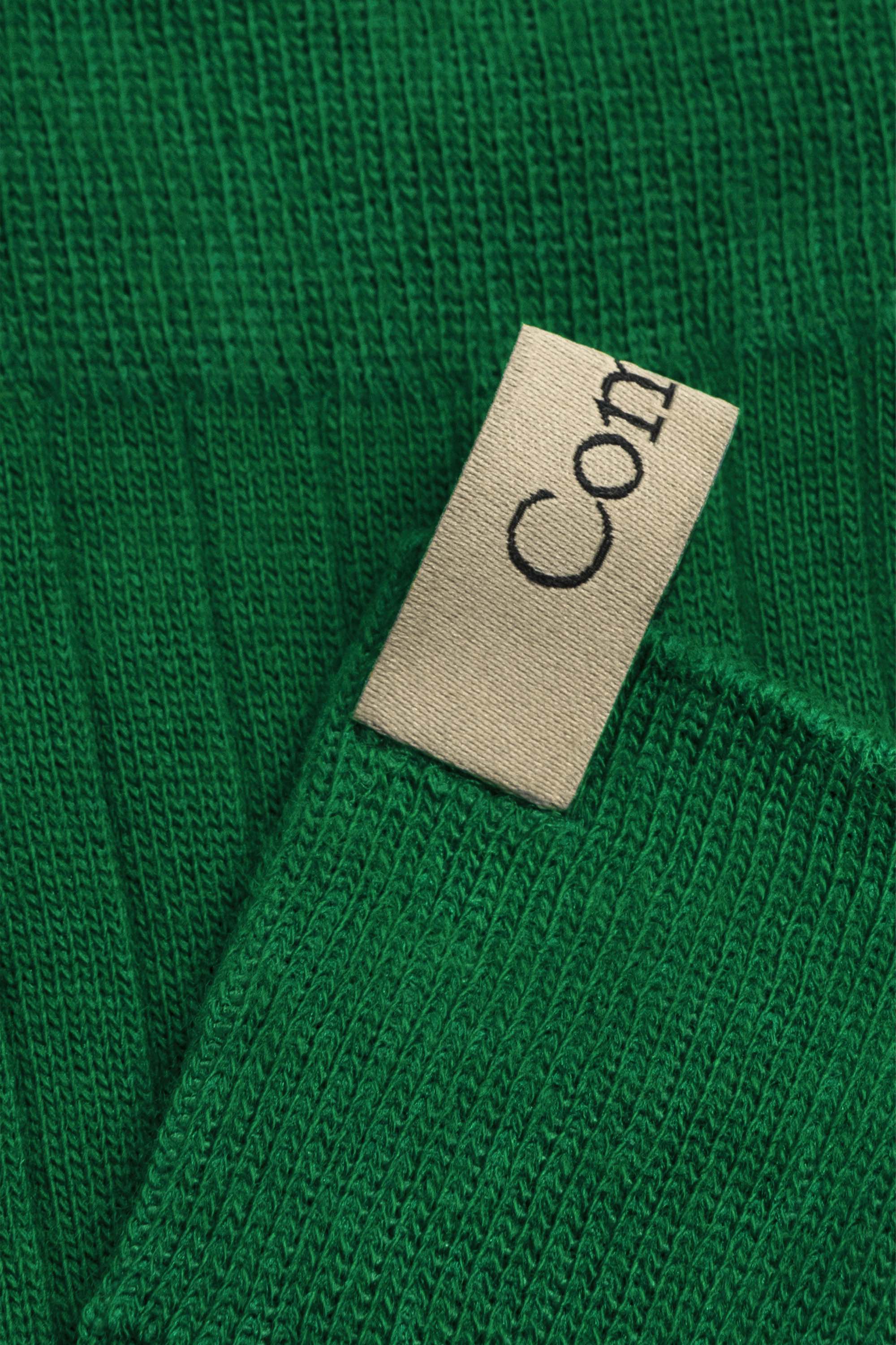 Ribbon tag cuff detail, The Yves Sock in Basil, primary green, Egyptian Cotton, Comme Si