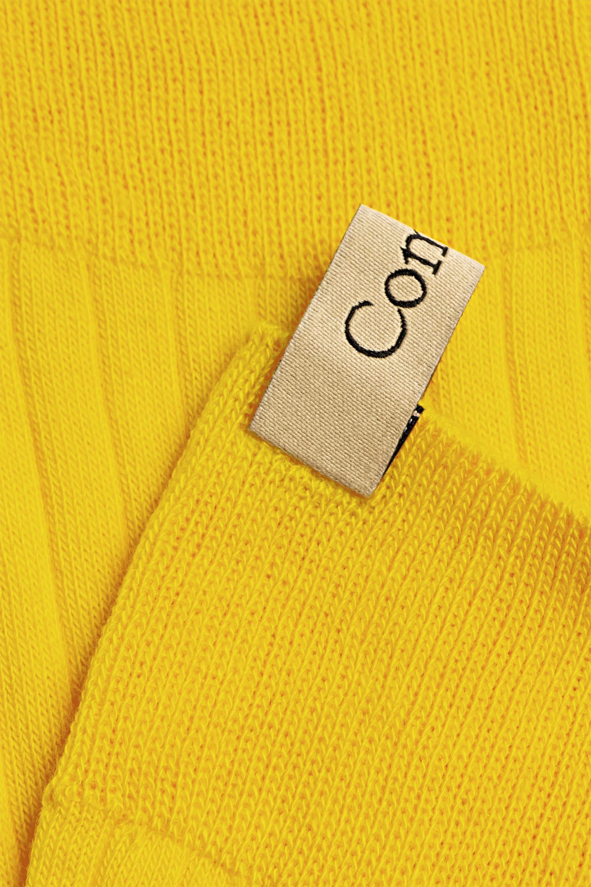 Ribbon tag detail, The Yves Sock in Canary, Egyptian cotton sock by Comme Si